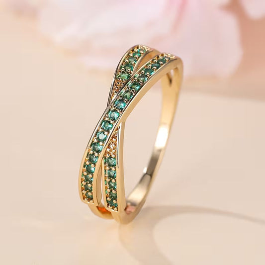 Anel Cruzado em X com Pedrinhas Verdes