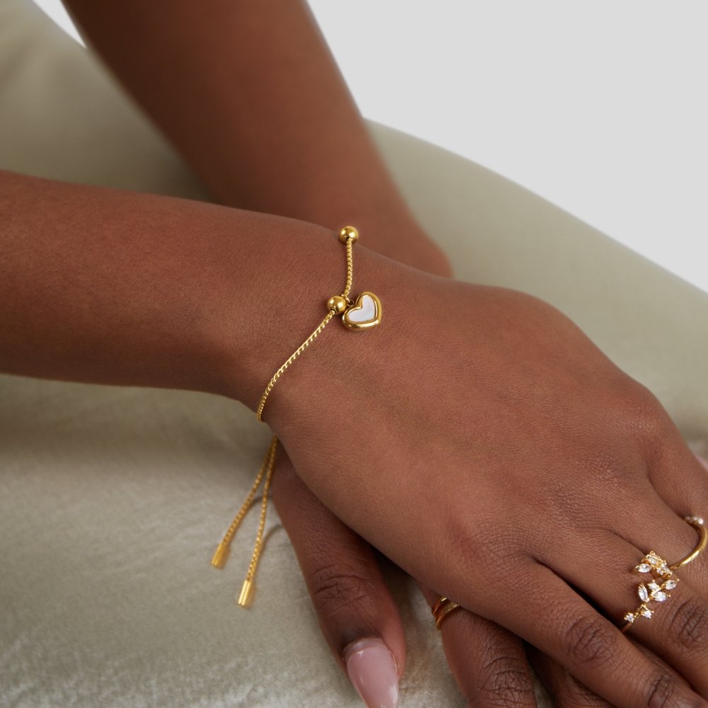 Pulseira Coração Branco com Bolinha de Correr
