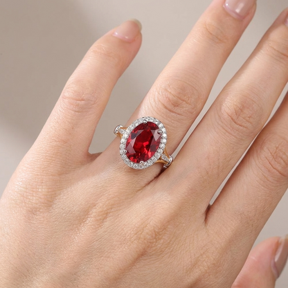 Anel Oval Vermelho com Orla Prateada e Aro Dourado