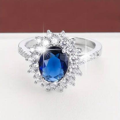 Anel Oval Azul-Escuro com Sol de Pedrinhas