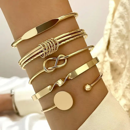 Conjunto Cinco Pulseiras Rígidas com Nó e Disco