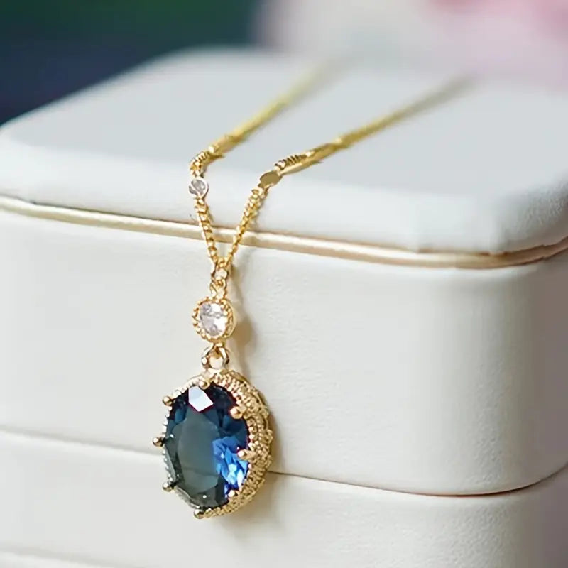 Colar Oval Azul-Escuro com Pedrinha Branca