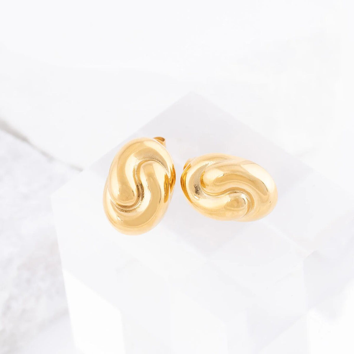 Brincos Oval com Onda em Relevo